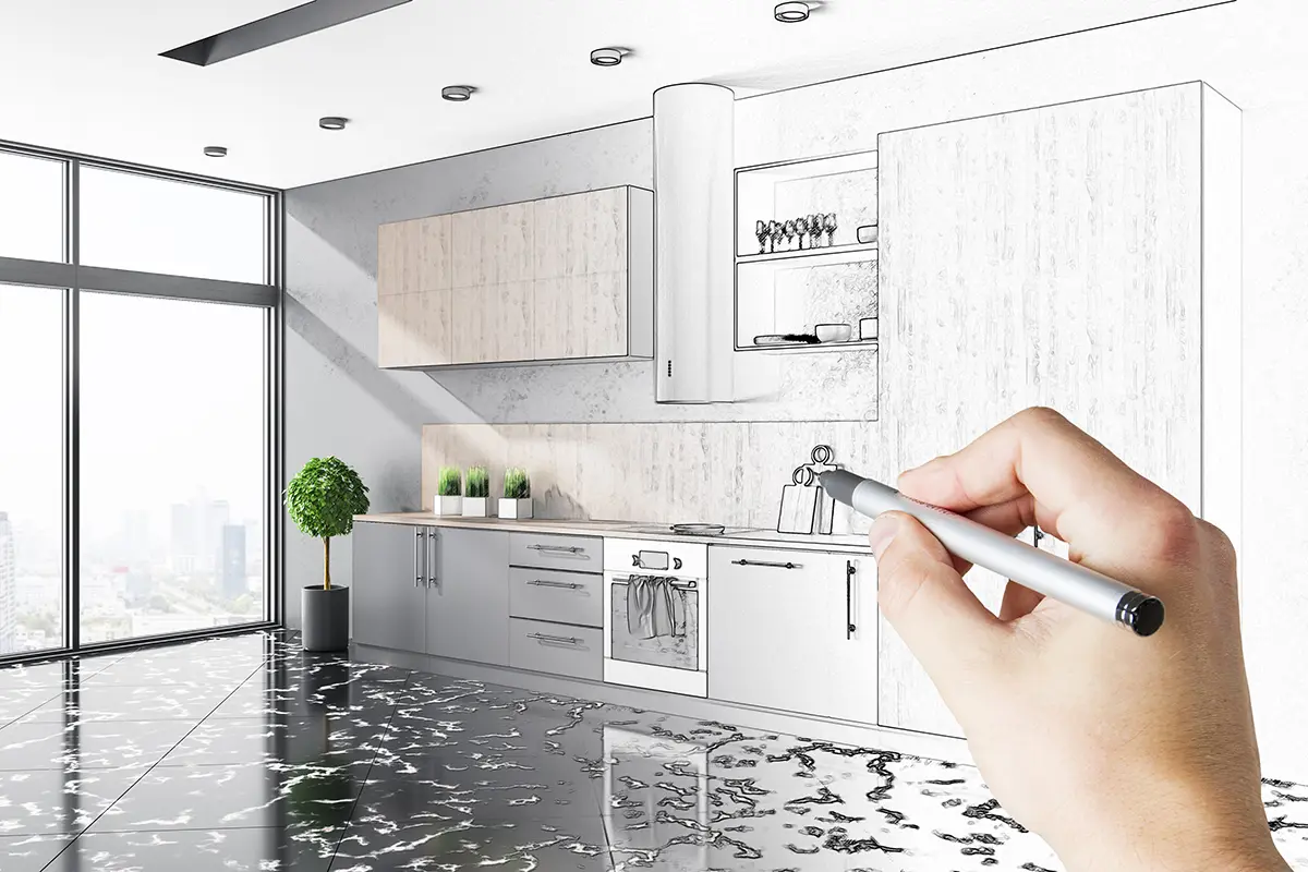 Eine Person zeichnet eine Küche