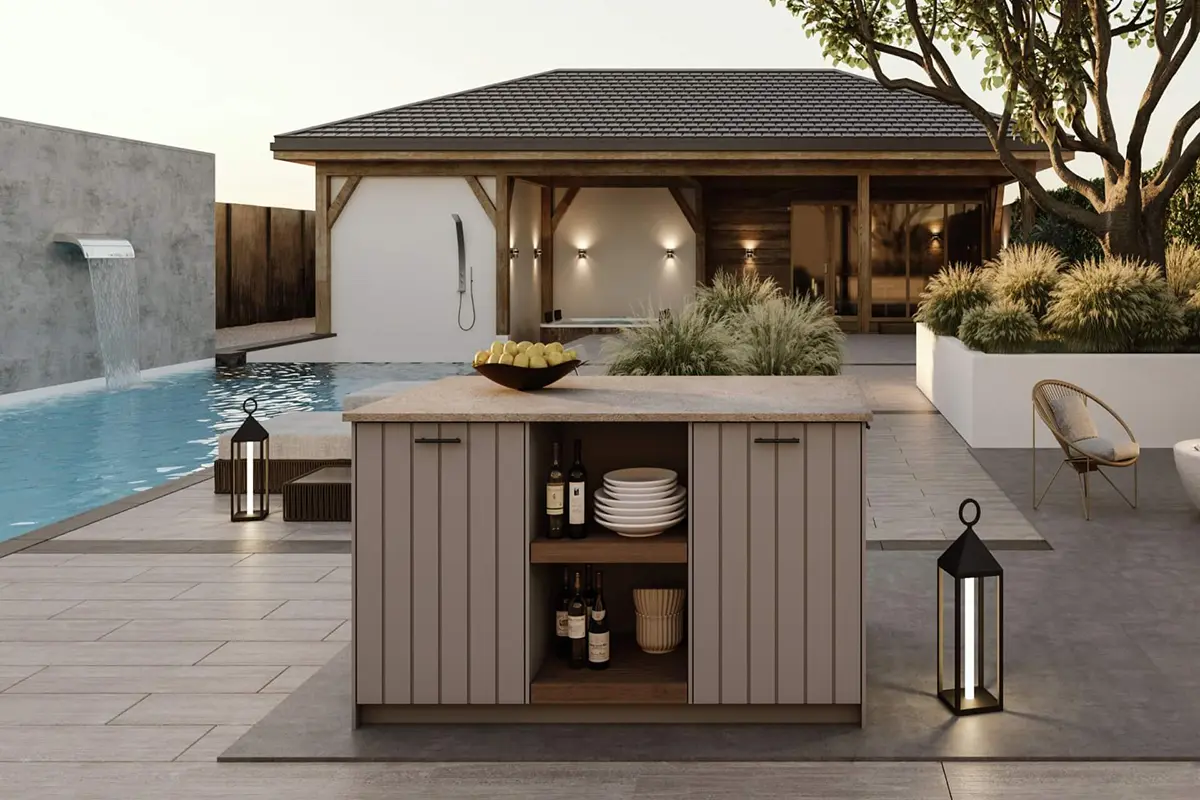 Eine Kücheninsel mit einem Tisch und Stühlen neben dem Pool